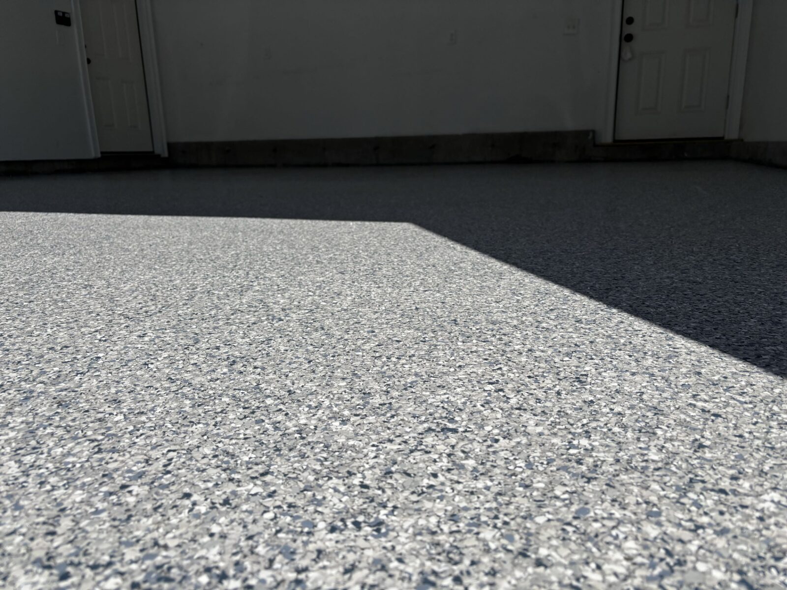 Epoxy Bros sunlit gray flake garage floor