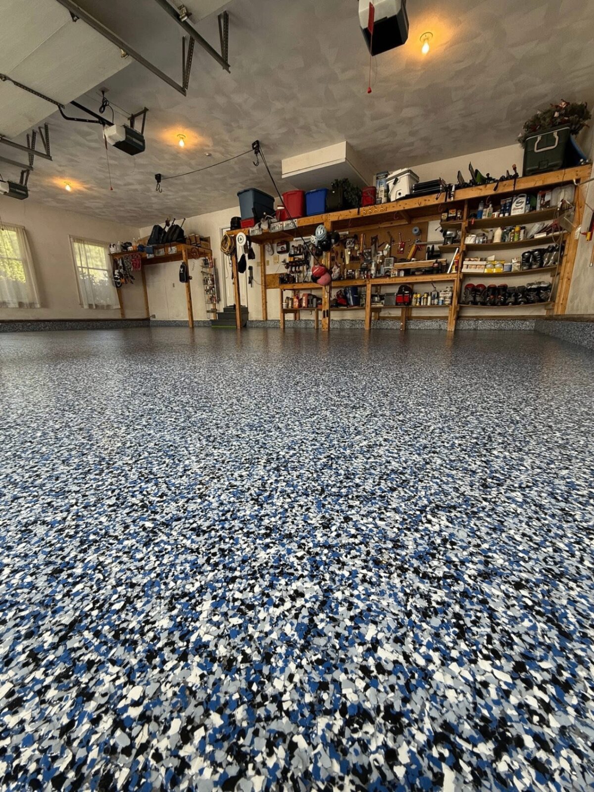 Epoxy Bros workshop blue and white flake floor