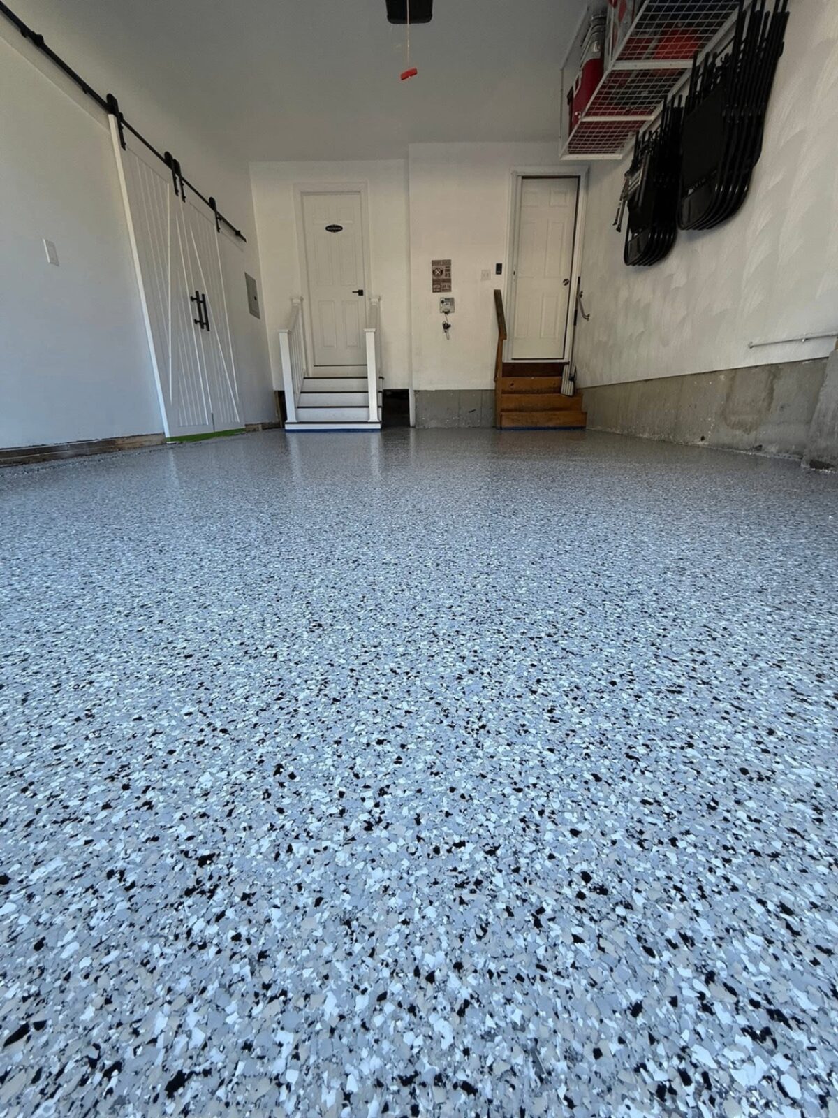 Epoxy Bros two-tone gray and black flake garage